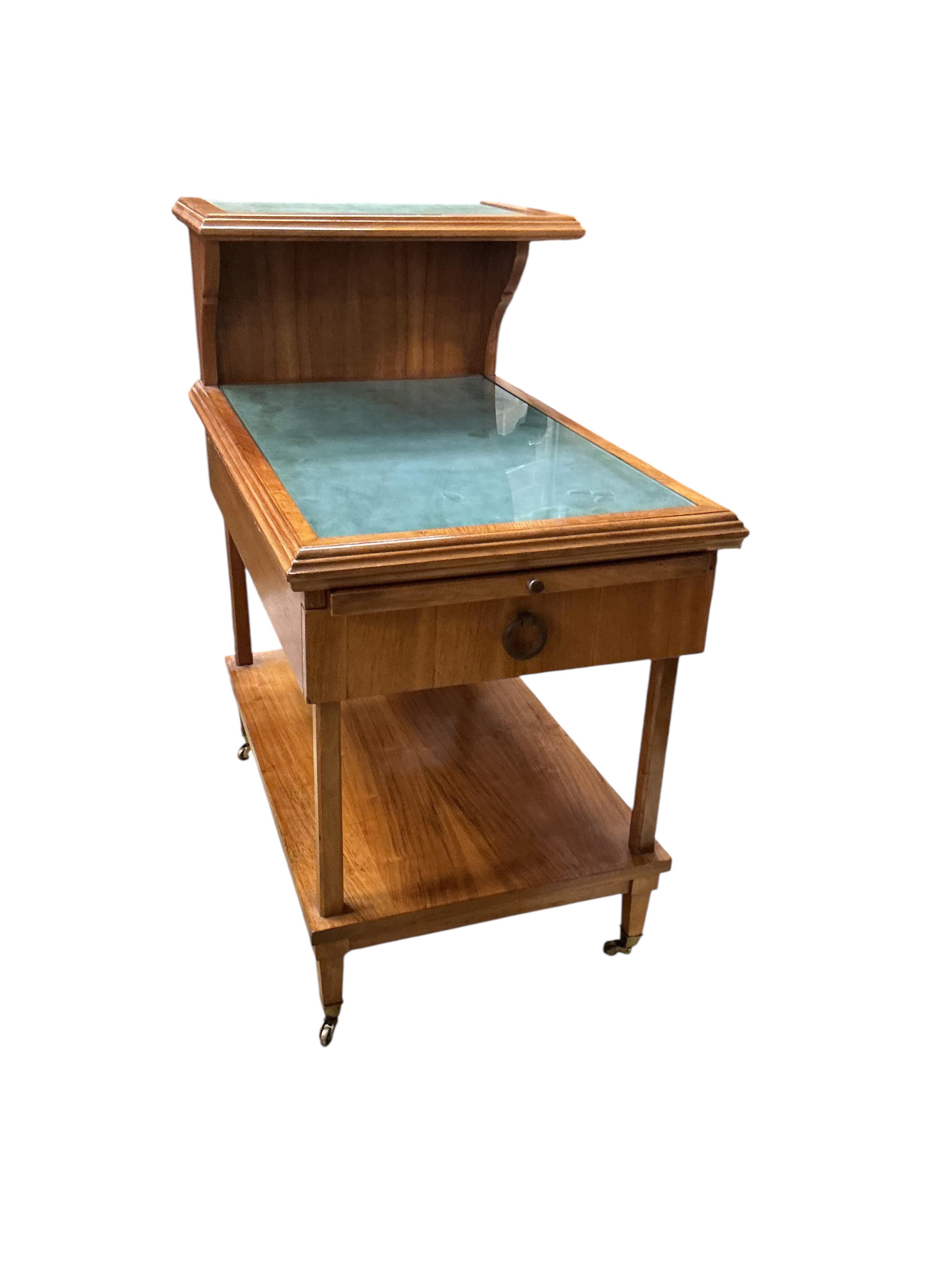 A pair of mid 20th century walnut bedside tables, width 46cm, depth 69cm, height 82cm